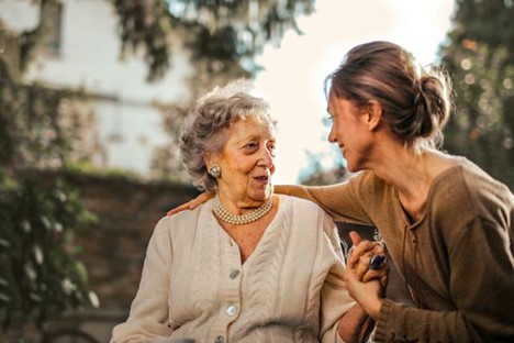 A person and a young person talking